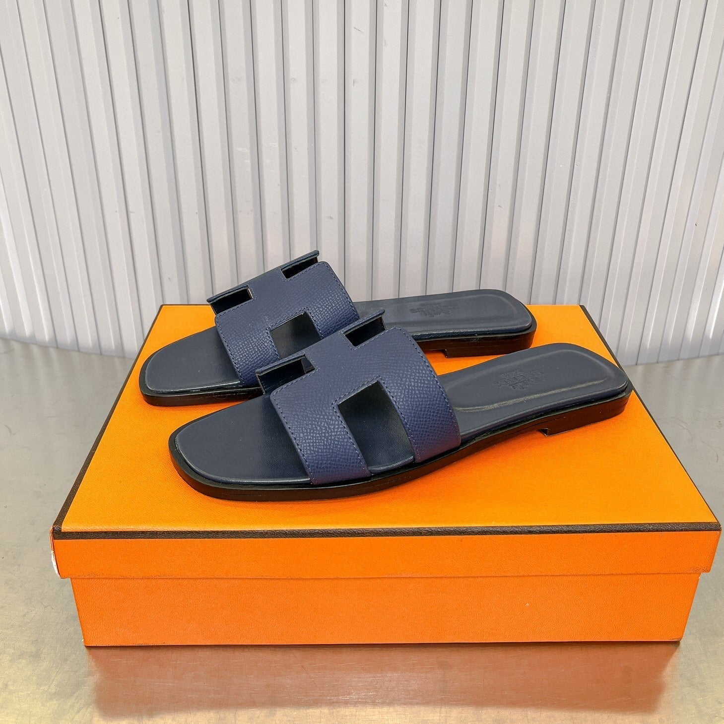 HERMES 0RAN SANDAL IN DARK BLUE CALFSKIN