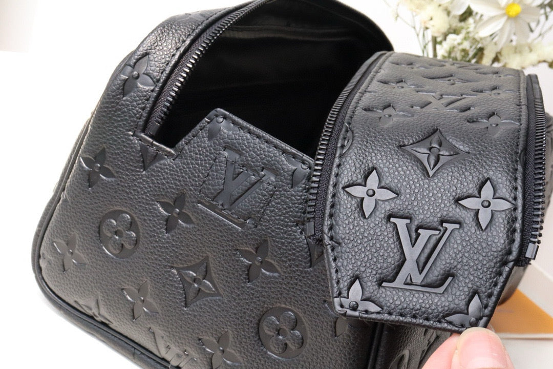 LOUIS VUITTON DOPP KIT TOILETRY BAG 28 CM IN BLACK TAURILLON MONOGRAM LEATHER