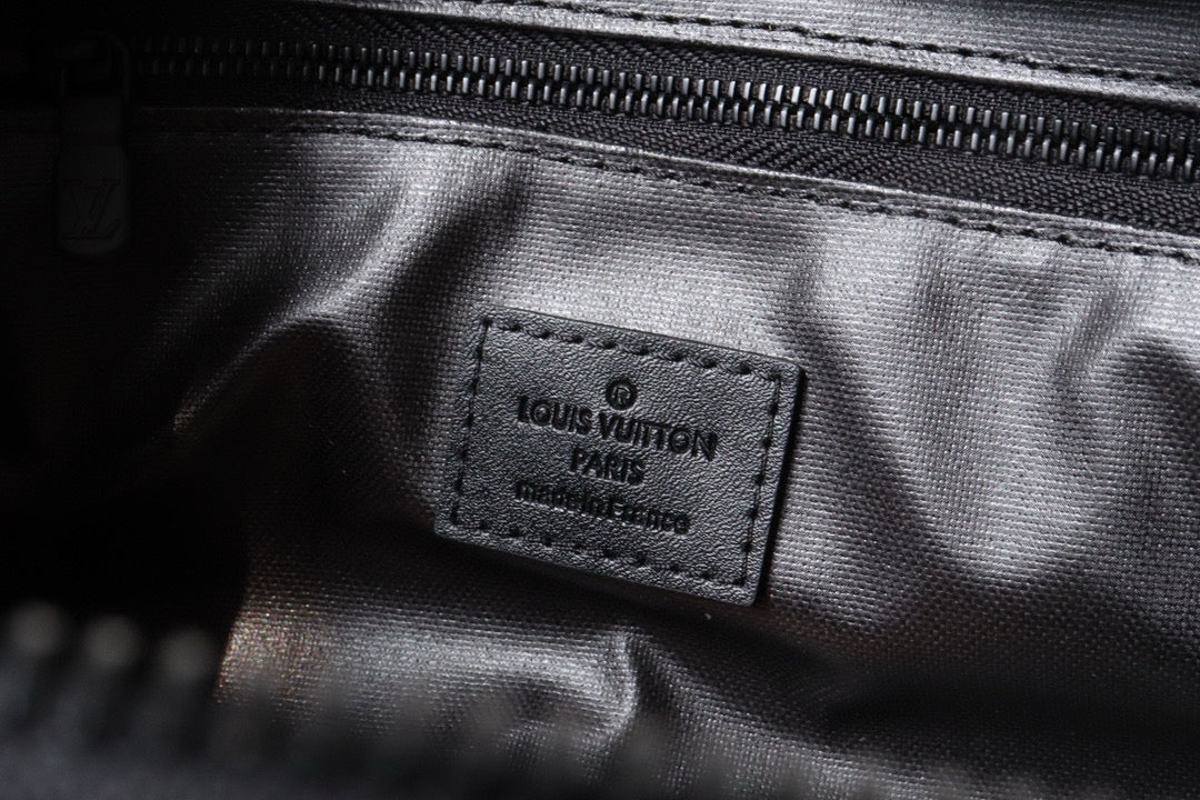 LOUIS VUITTON DOPP KIT TOILETRY BAG 28 CM IN BLACK TAURILLON MONOGRAM LEATHER