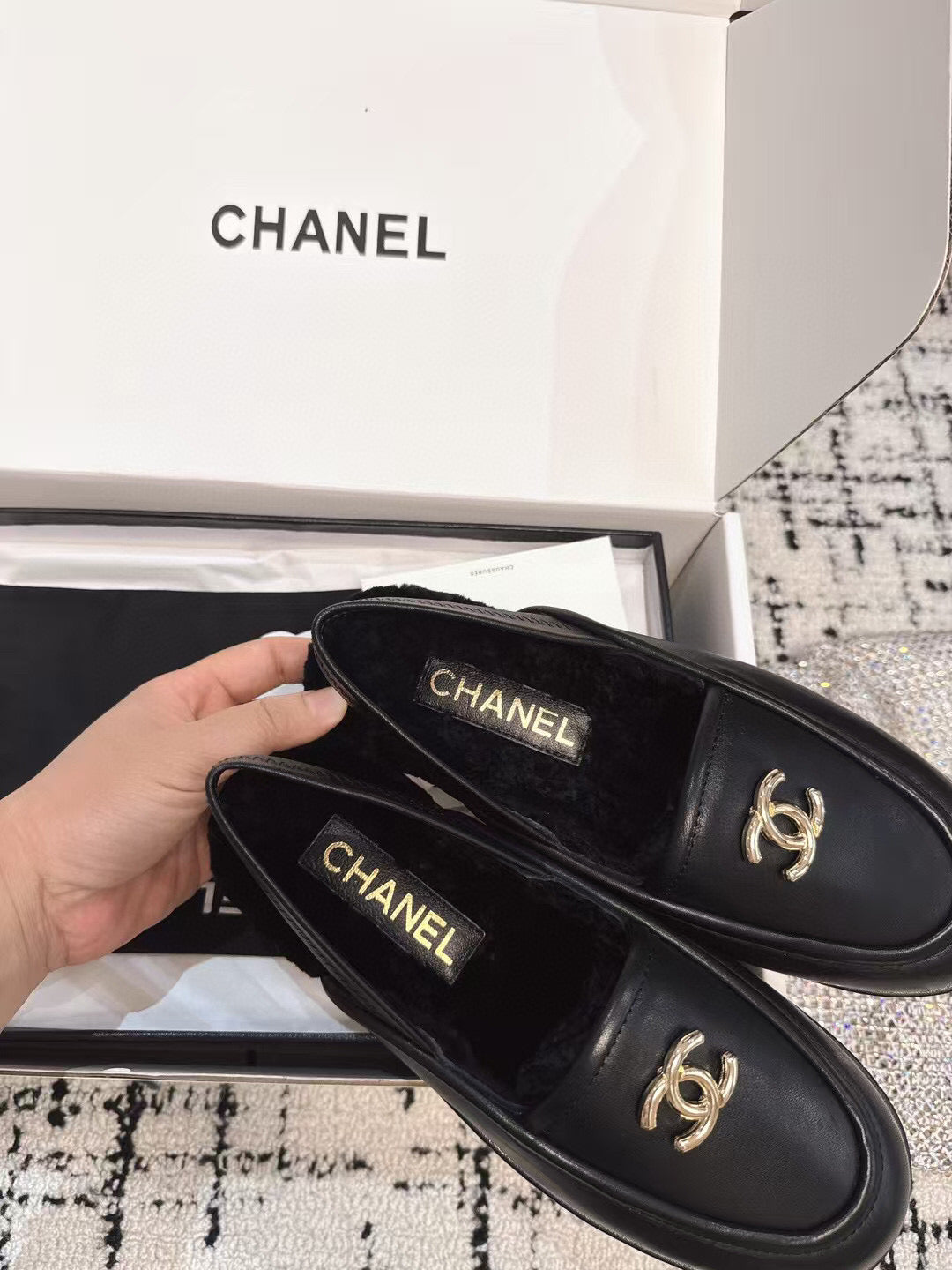 CHANEL SLINGBACK LOAFER IN BLACK CALFSKIN AND SHEARLING