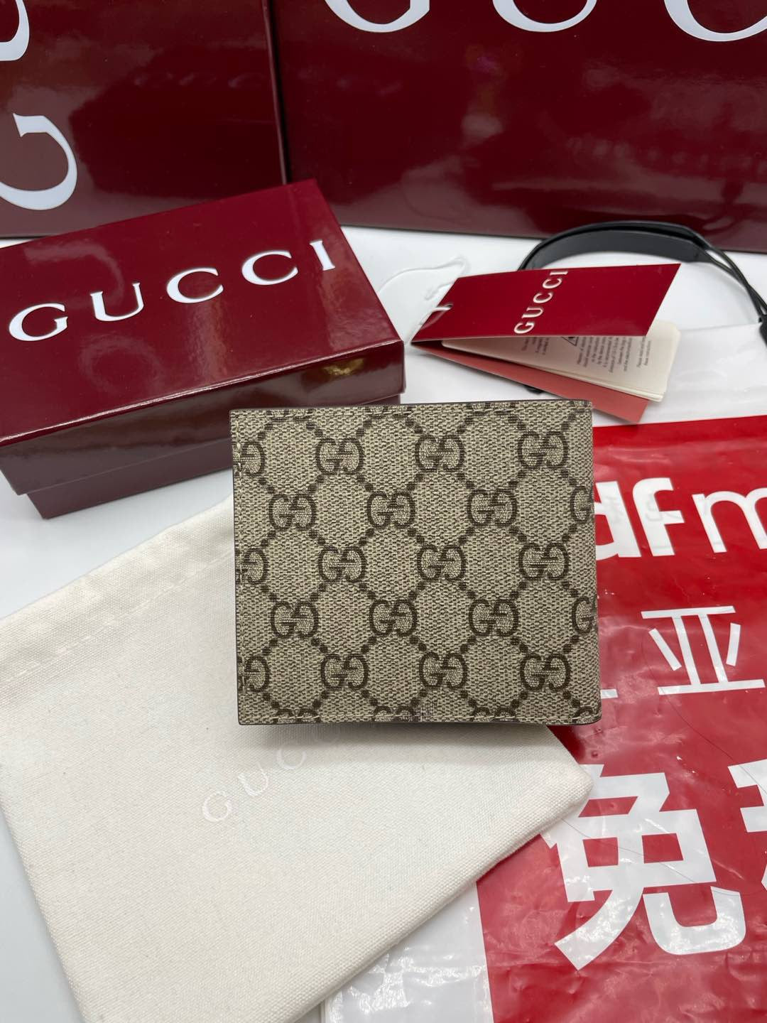 GUCCI BI-FOLD WALLET IN BEIGE MIX BROWN CANVAS