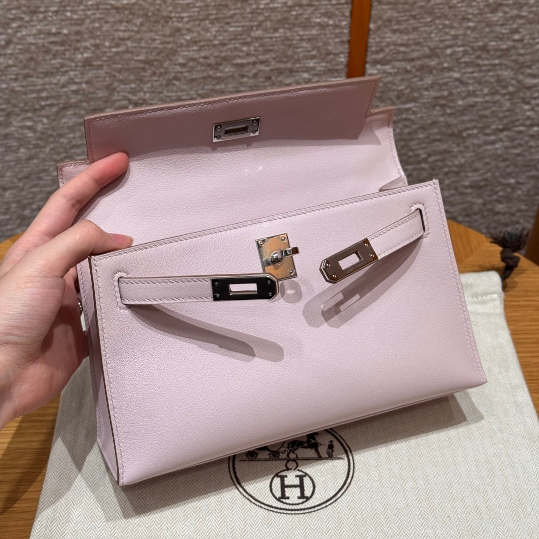 HERMES KELLY POCHETTE 22 IN LIGHT PINK CALFSKIN SILVER HARDWARE