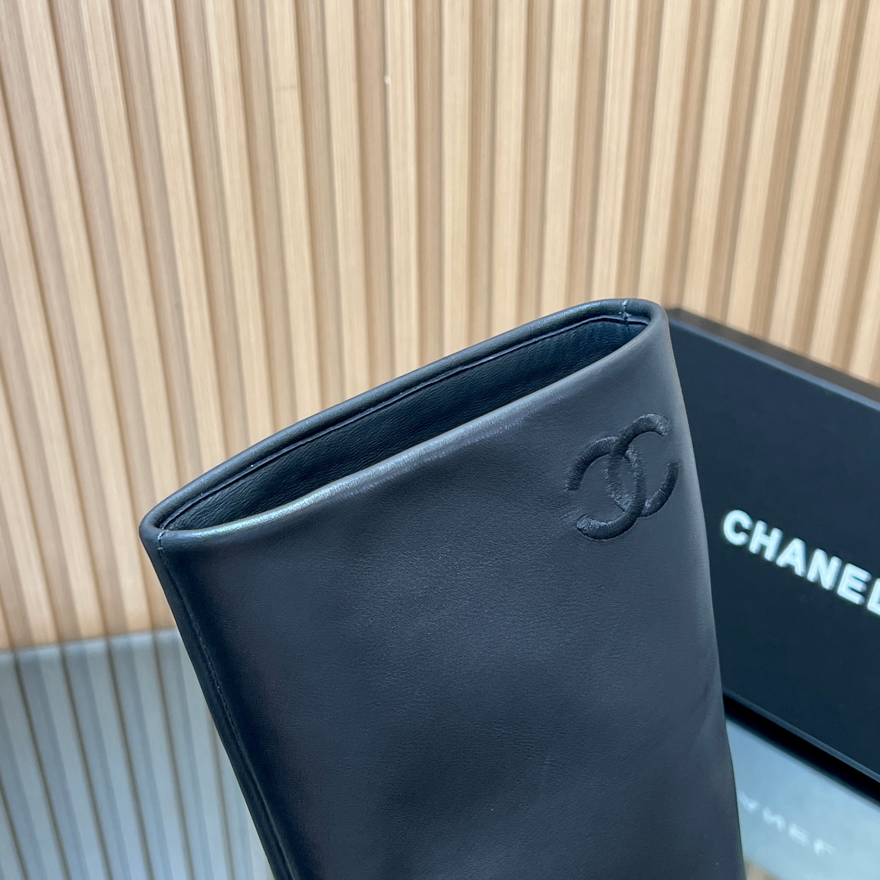CHANEL 25S KNEE-HIGH HEELED BOOTS 65MM IN BLACK CALFSKIN GOLD HARDWARE