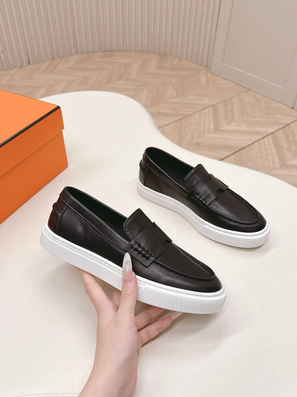 HERMES 25S SLIP-ON IN BLACK LAMBSKIN