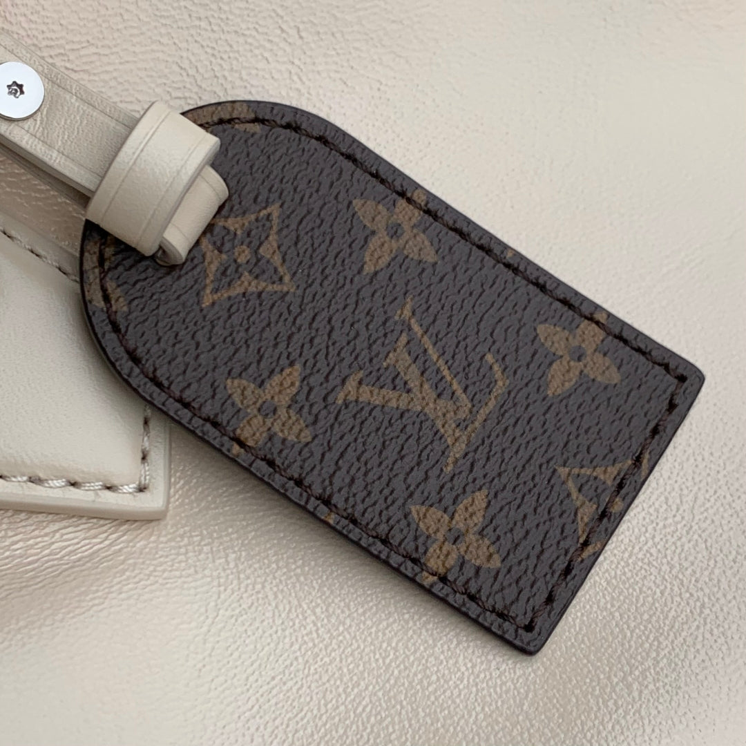 LOUIS VUITTON SPEEDY CARGO VIBE 28 IN VANILLE LAMBSKIN MONOGRAM LOGO TAG