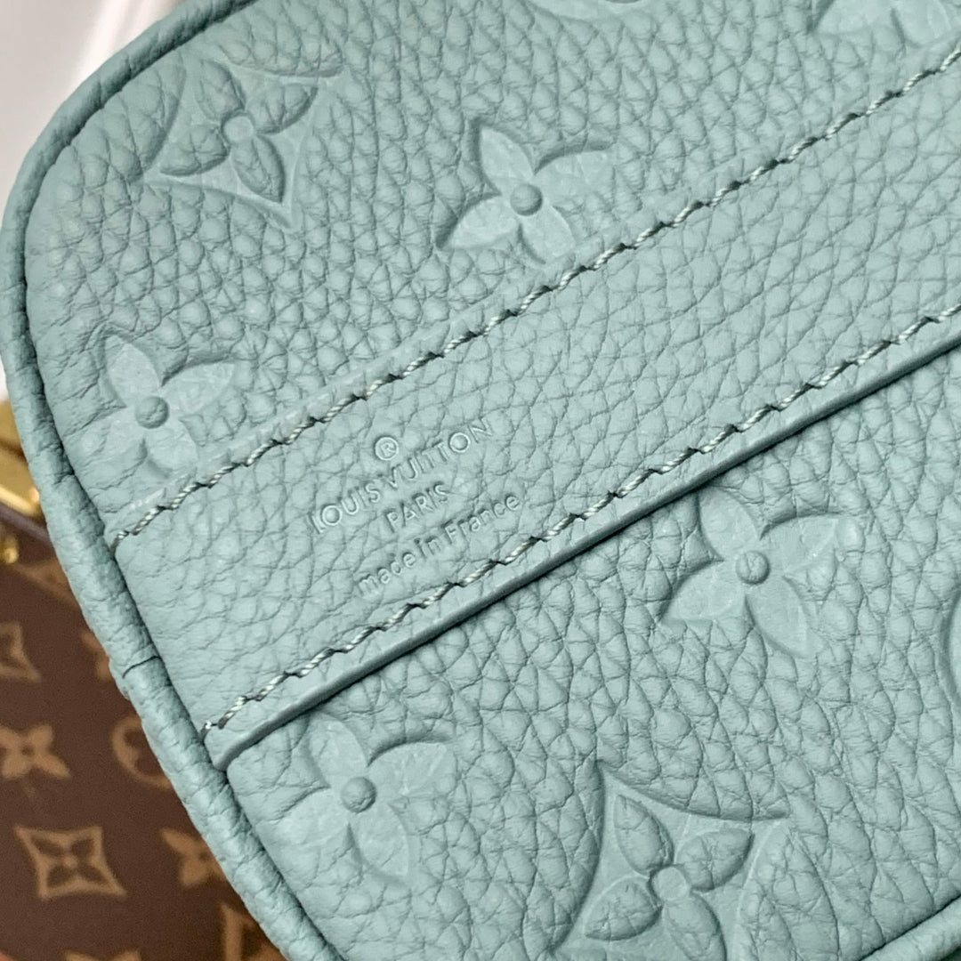 LOUIS VUITTON KEEPALL BANDOULIÈRE 25 BAG IN MISTY LAKE GREEN MONOGRAM TAURILLON CALFSKIN
