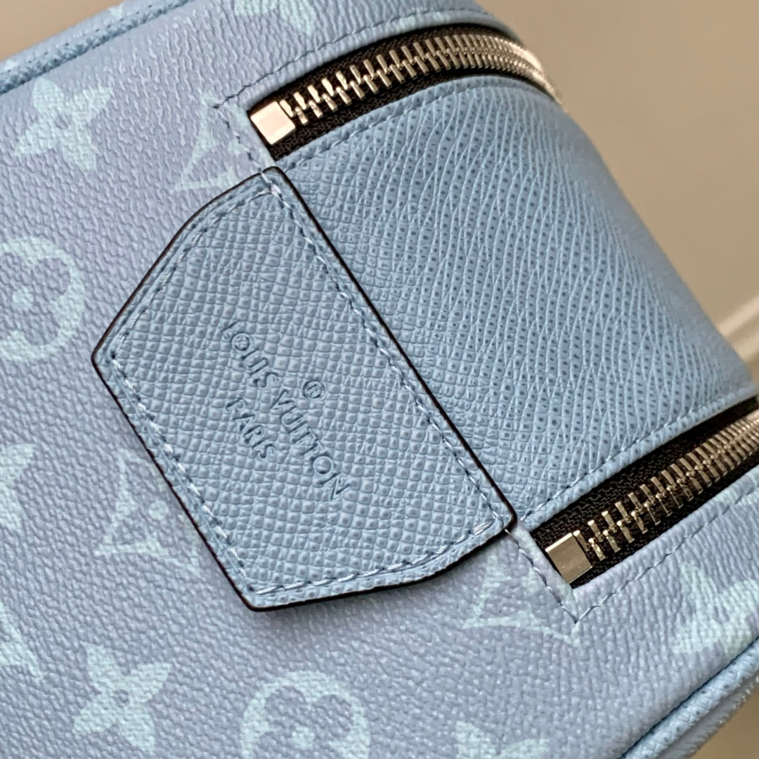 LOUIS VUITTON DOPP KIT 28 IN BLUE MONOGRAM COATED CANVAS
