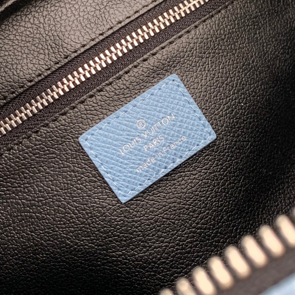 LOUIS VUITTON DOPP KIT 28 IN BLUE MONOGRAM COATED CANVAS