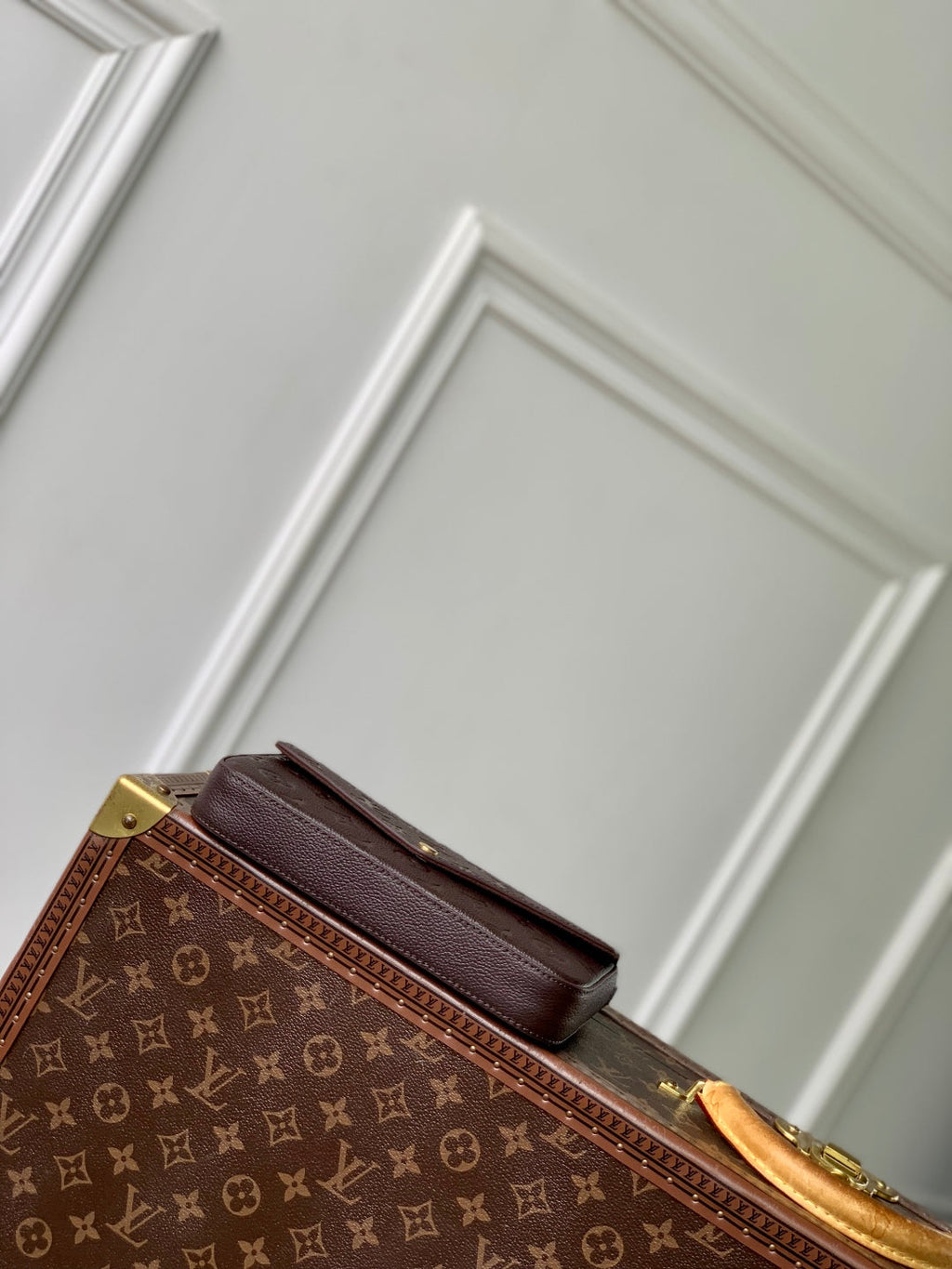 LOUIS VUITTON FÉLICIE POCHETTE 21 IN DARK BROWN MONOGRAM EMBOSSED LOGO CALFSKIN