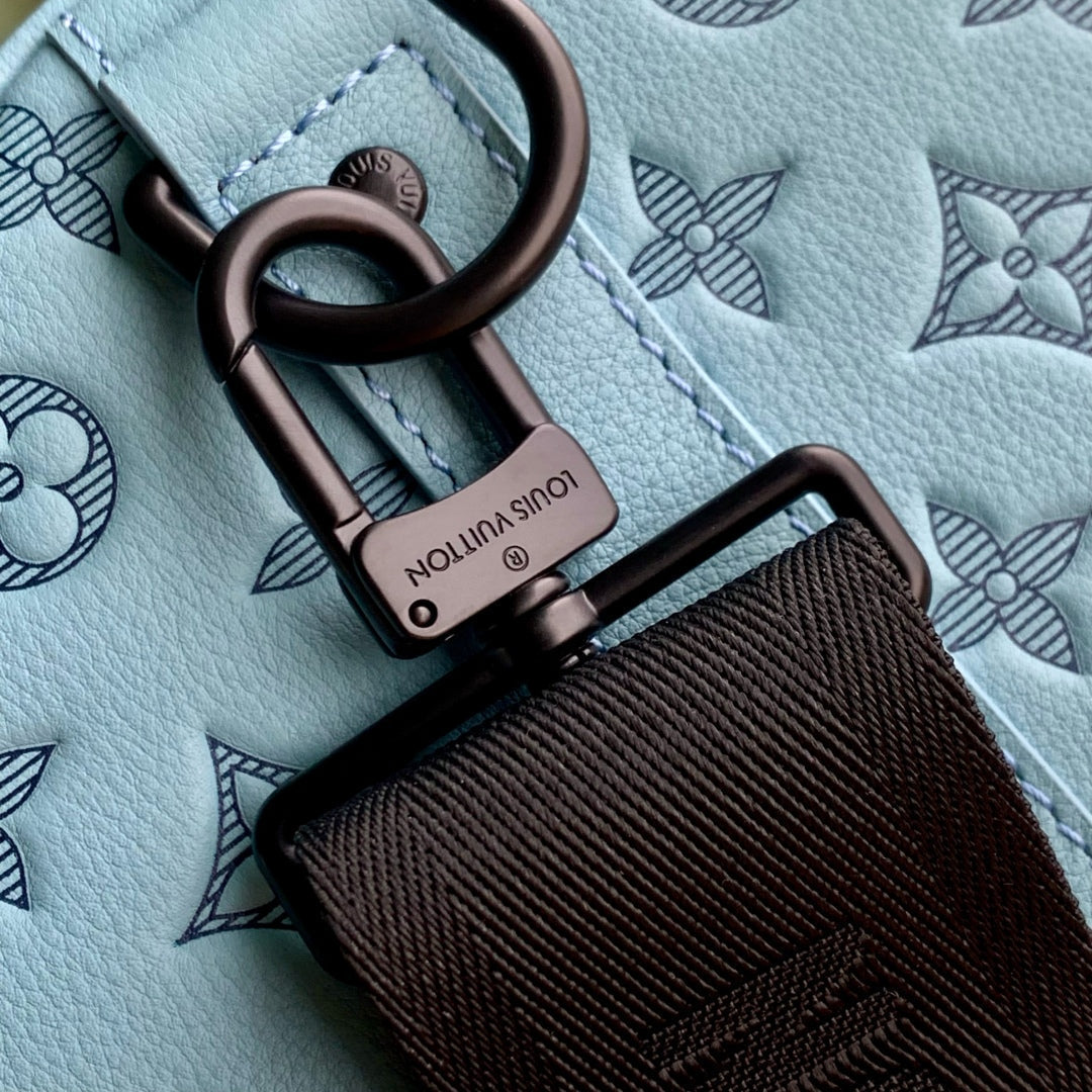 LOUIS VUITTON KEEPALL BANDOULIÈRE 50 IN SKY BLUE MONOGRAM SHADOW EMBOSSED CALFSKIN