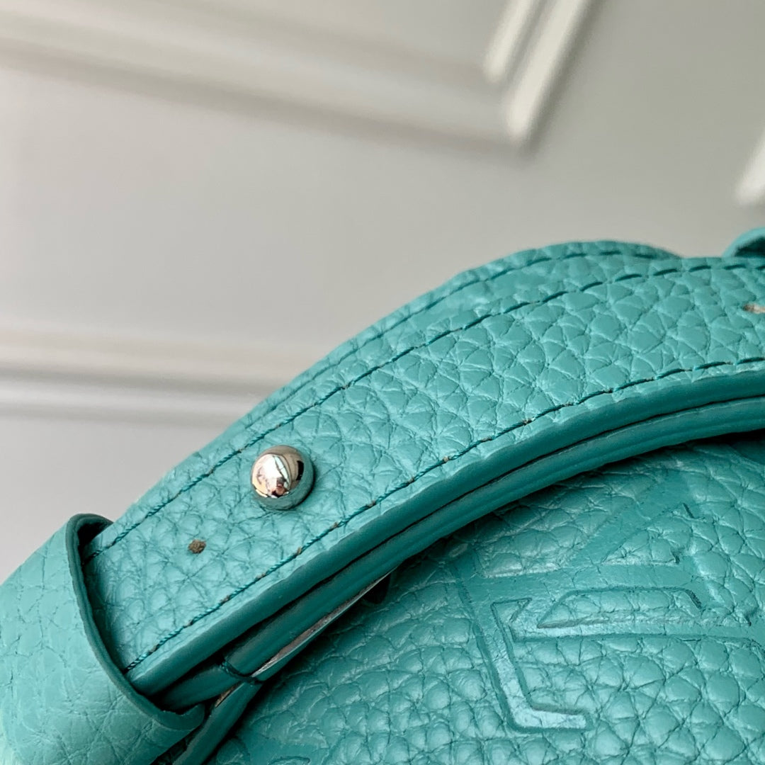 LOUIS VUITTON STEAMER WEARABLE WALLET 18 IN TEAL GREEN MONOGRAM TAURILLON CALFSKIN