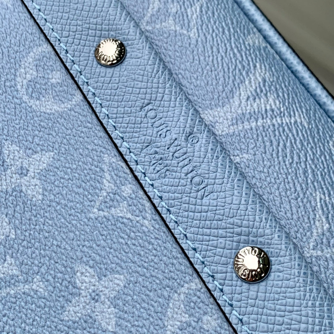LOUIS VUITTON ALPHA MESSENGER 24 IN BLUE MONOGRAM COATED CANVAS AND CALFSKIN