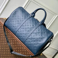 LOUIS VUITTON KEEPALL BANDOULIÈRE 50 IN DARK BLUE MONOGRAM SHADOW EMBOSSED CALFSKIN