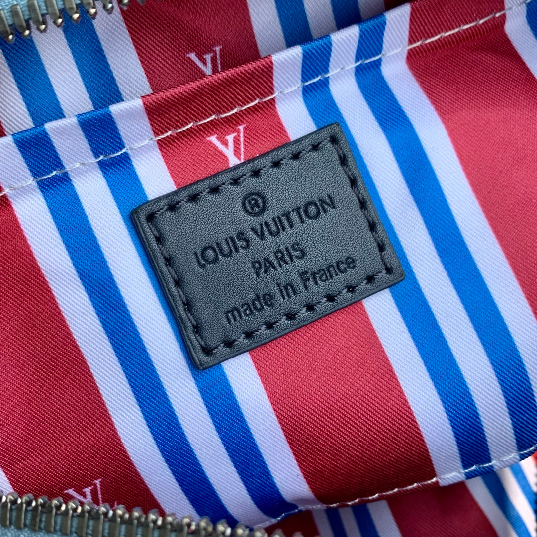 LOUIS VUITTON KEEPALL BANDOULIÈRE 25 INSKY BLUE MONOGRAM HERITAGE CANVAS DARK BLUE CALFSKIN