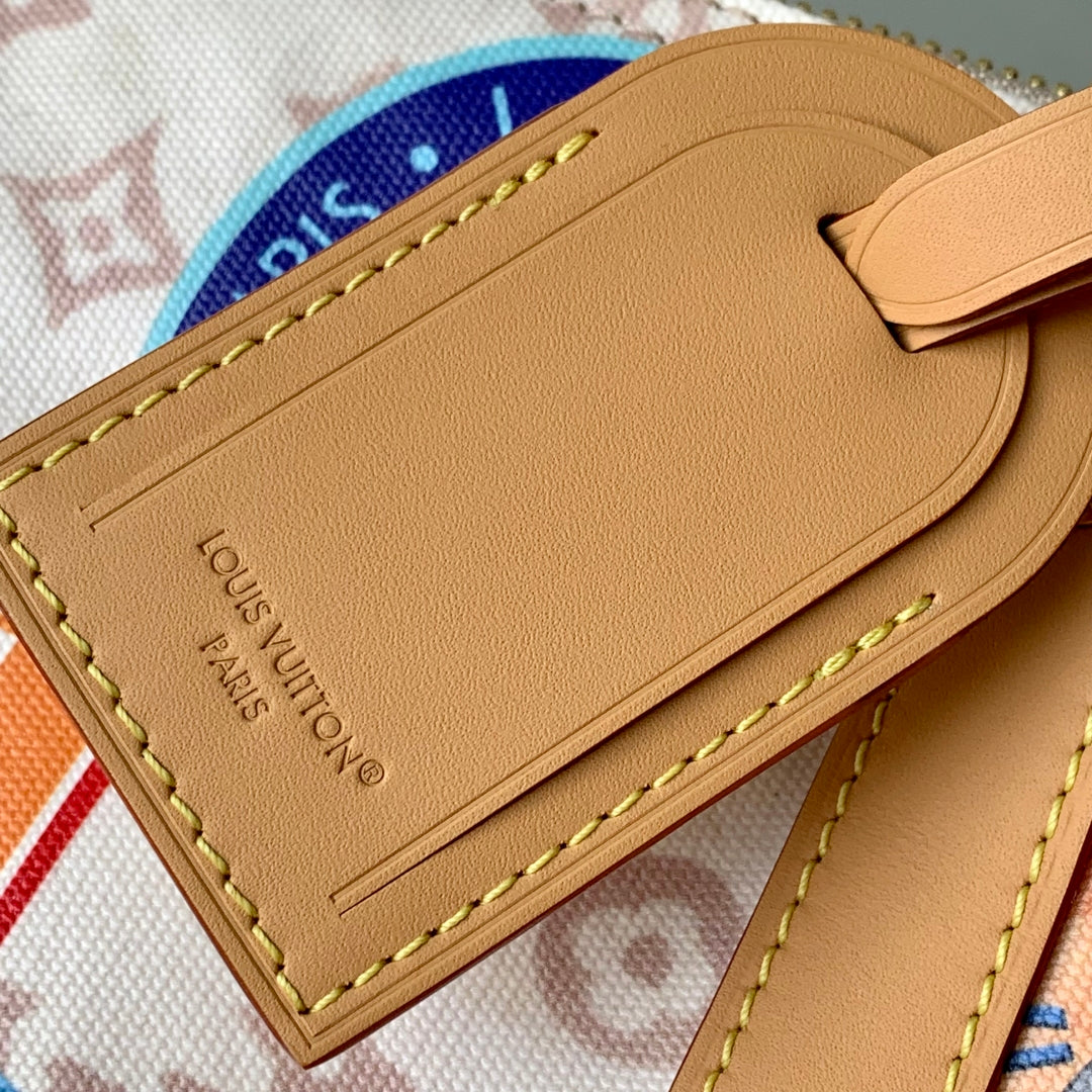 LOUIS VUITTON KEEPALL BANDOULIÈRE 45 IN WHITE MONOGRAM DUNE CANVAS AND CALFSKIN