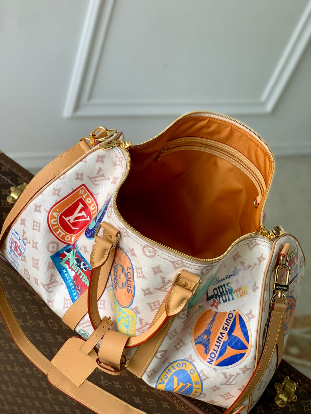 LOUIS VUITTON KEEPALL BANDOULIÈRE 45 IN WHITE MONOGRAM DUNE CANVAS AND CALFSKIN