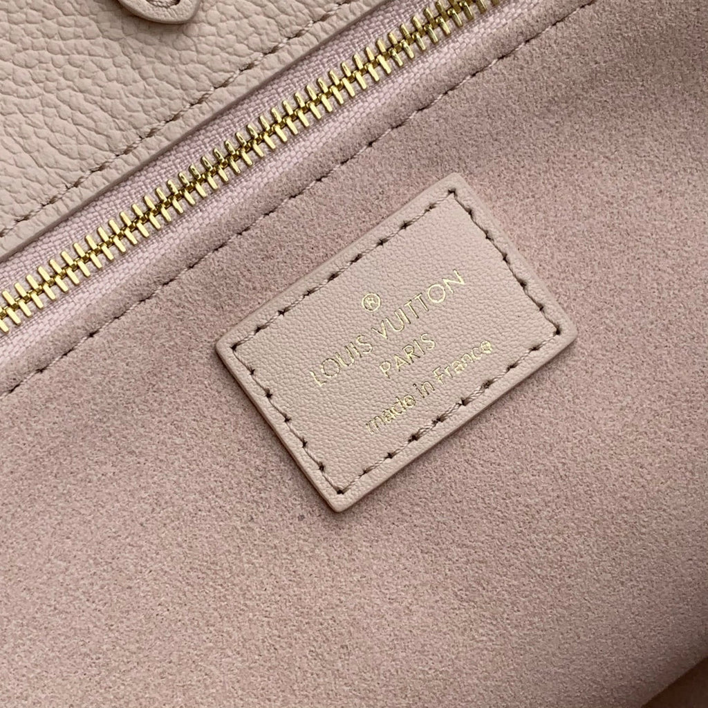 LOUIS VUITTON ONTHEGO MM 35 IN  BLUSH PINK MONOGRAM CALFSKIN