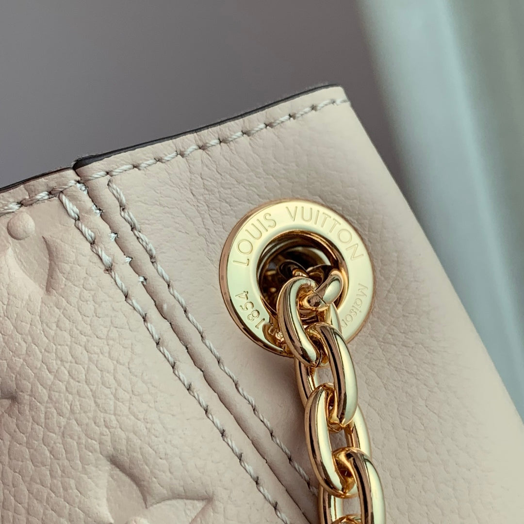 LOUIS VUITTON ANYTIME PM 34 IN NUDE PINK MONOGRAM EMPREINTE CALFSKIN