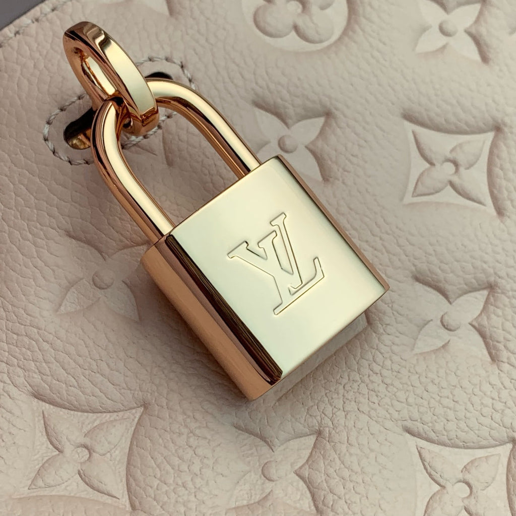 LOUIS VUITTON ANYTIME PM 34 IN NUDE PINK MONOGRAM EMPREINTE CALFSKIN