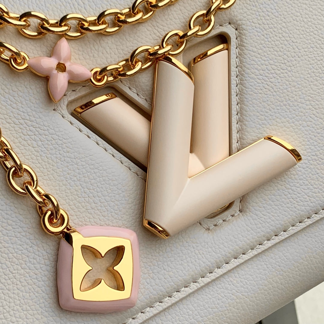 LOUIS VUITTON TWIST SLIM 19 IN LIGHT PINK TAURILLON CALFSKIN GOLD HARDWARE