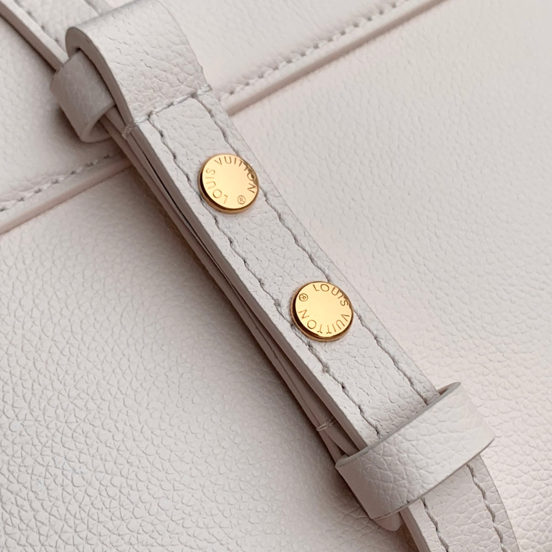 LOUIS VUITTON TWIST SLIM 19 IN LIGHT PINK TAURILLON CALFSKIN GOLD HARDWARE