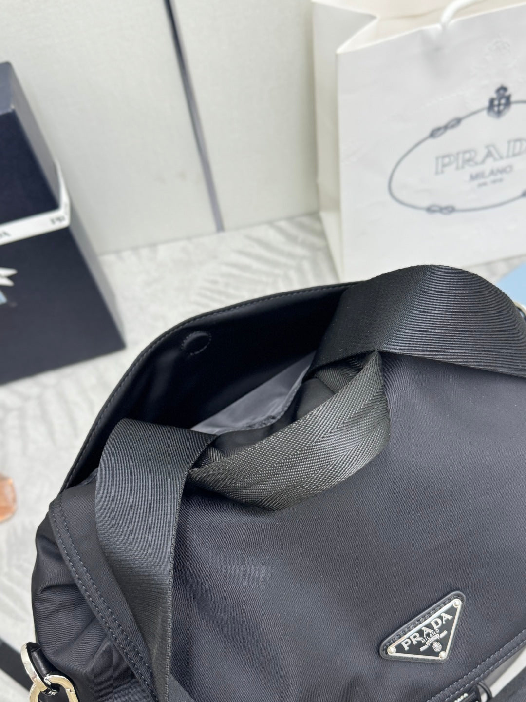 PRADA 25S EXPLORE BACKPACK 39 IN BLACK RE-NYLON AND CALFSKIN