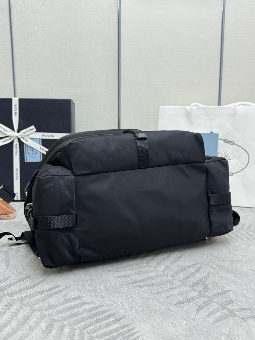 PRADA 25S EXPLORE BACKPACK 39 IN BLACK RE-NYLON AND CALFSKIN