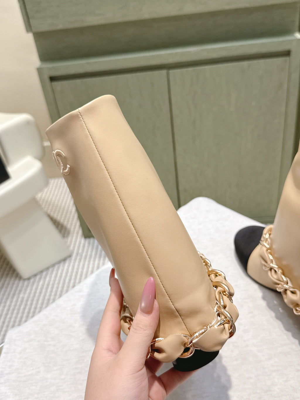 CHANEL 25S CALF-LENGTH BOOTS 45MM IN BEIGE AND BLACK CALFSKIN GOLD HARDWARE