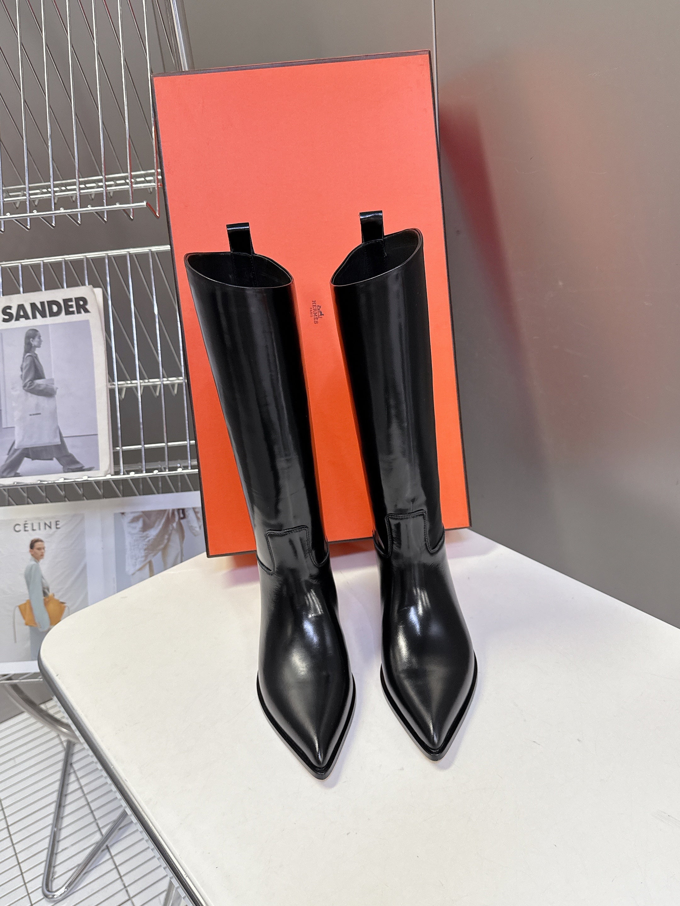HERMES 25S POINTED-TOE KNEE-HIGH BOOTS IN BLACK GLOSSY LAMBSKIN