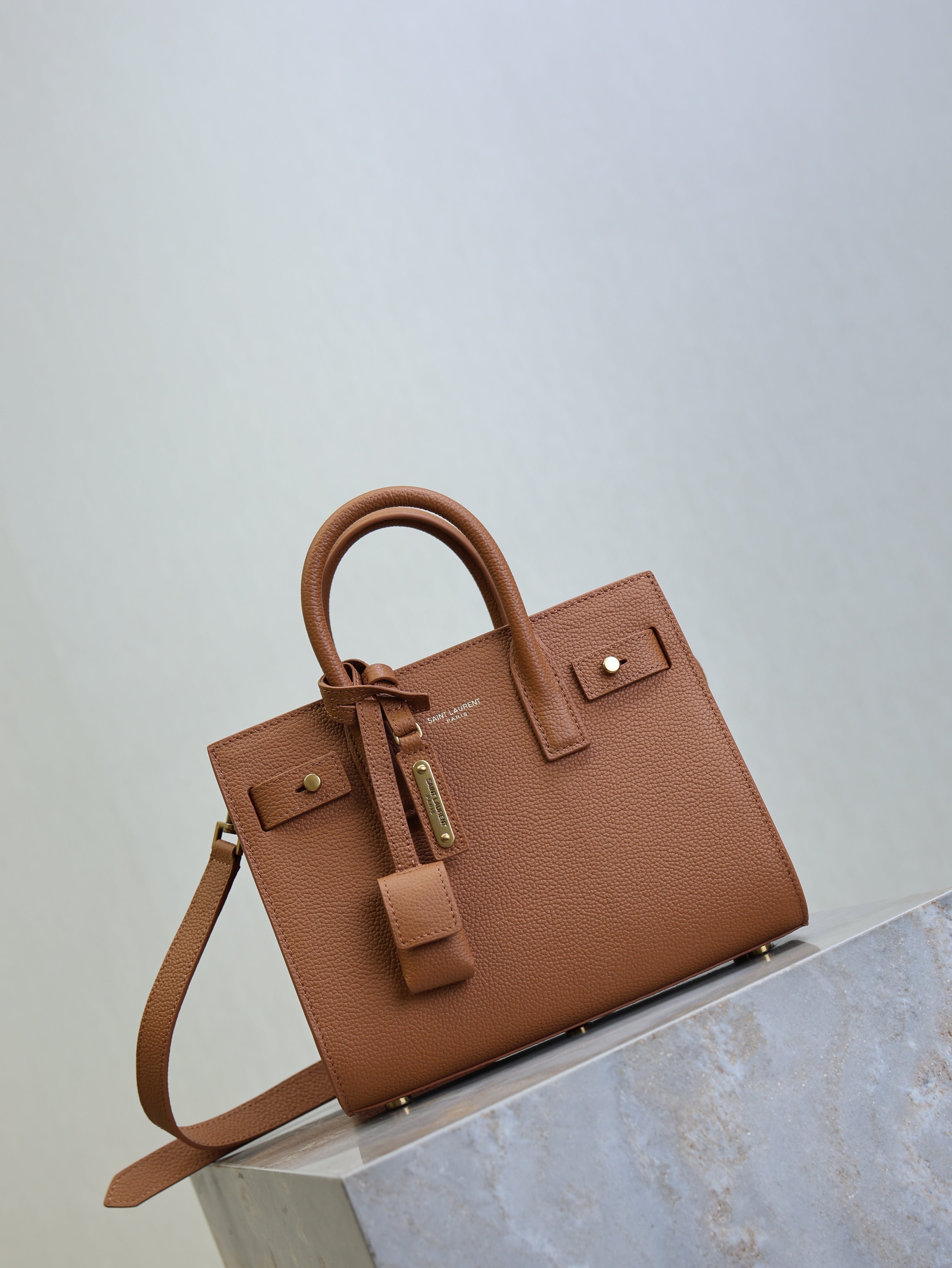 YSL 25S SAC DE JOUR 22 IN CHESTNUT BROWN SUPPLE GRAINED CALFSKIN