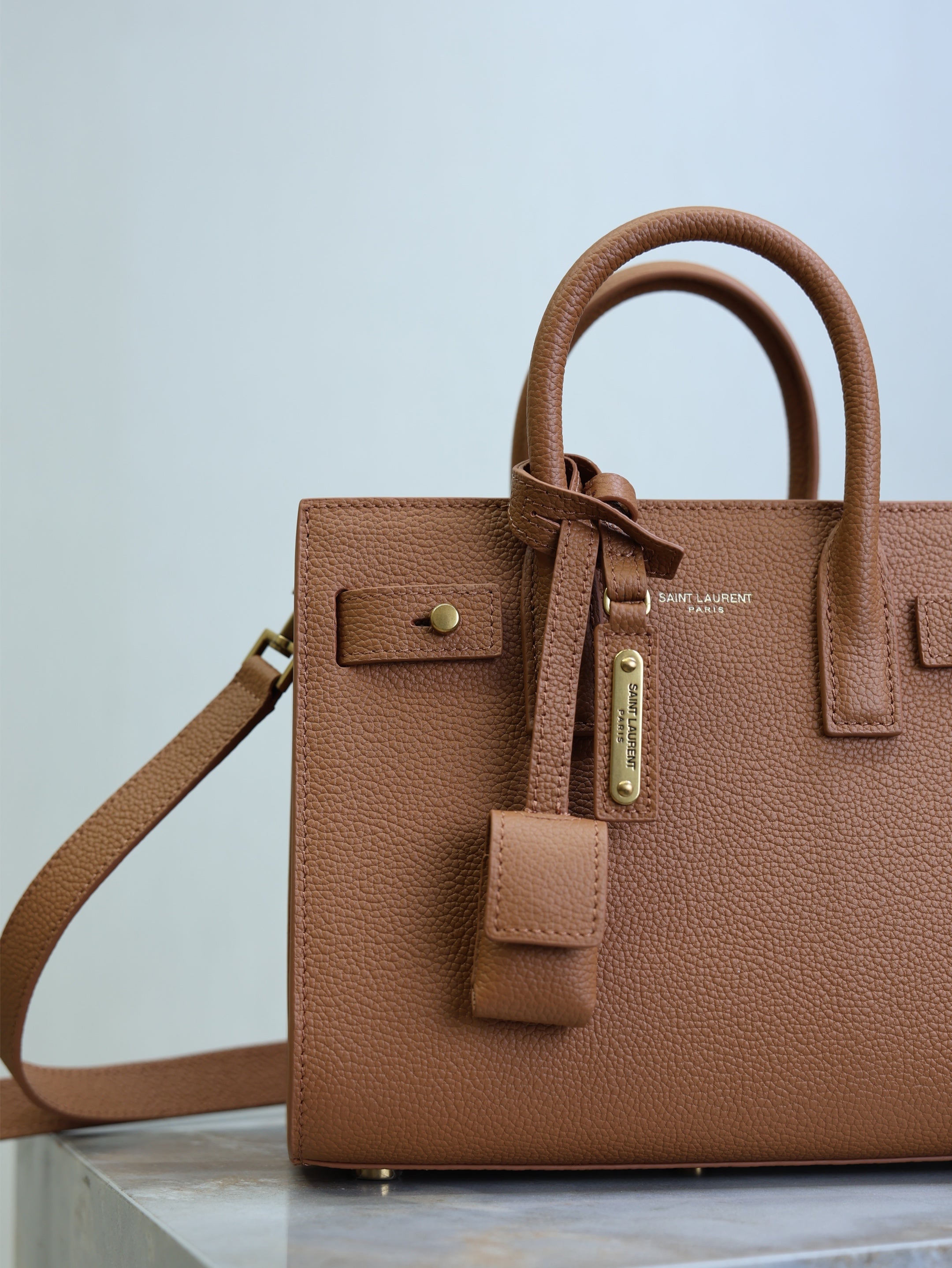 YSL 25S SAC DE JOUR 22 IN CHESTNUT BROWN SUPPLE GRAINED CALFSKIN