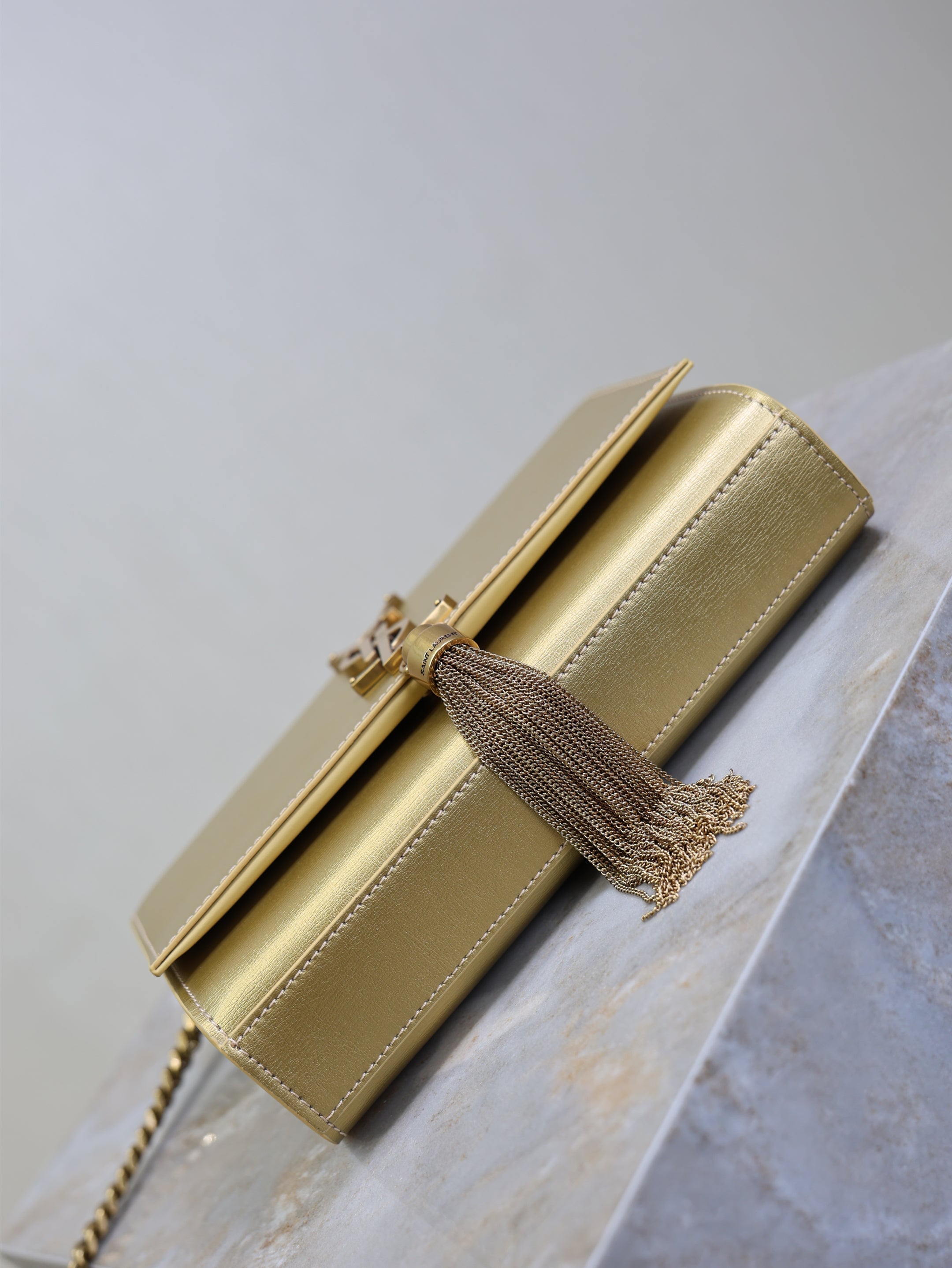 YSL 25S KATE TASSEL 20 IN GOLD METALLIC CALFSKIN GOLD HARDWARE