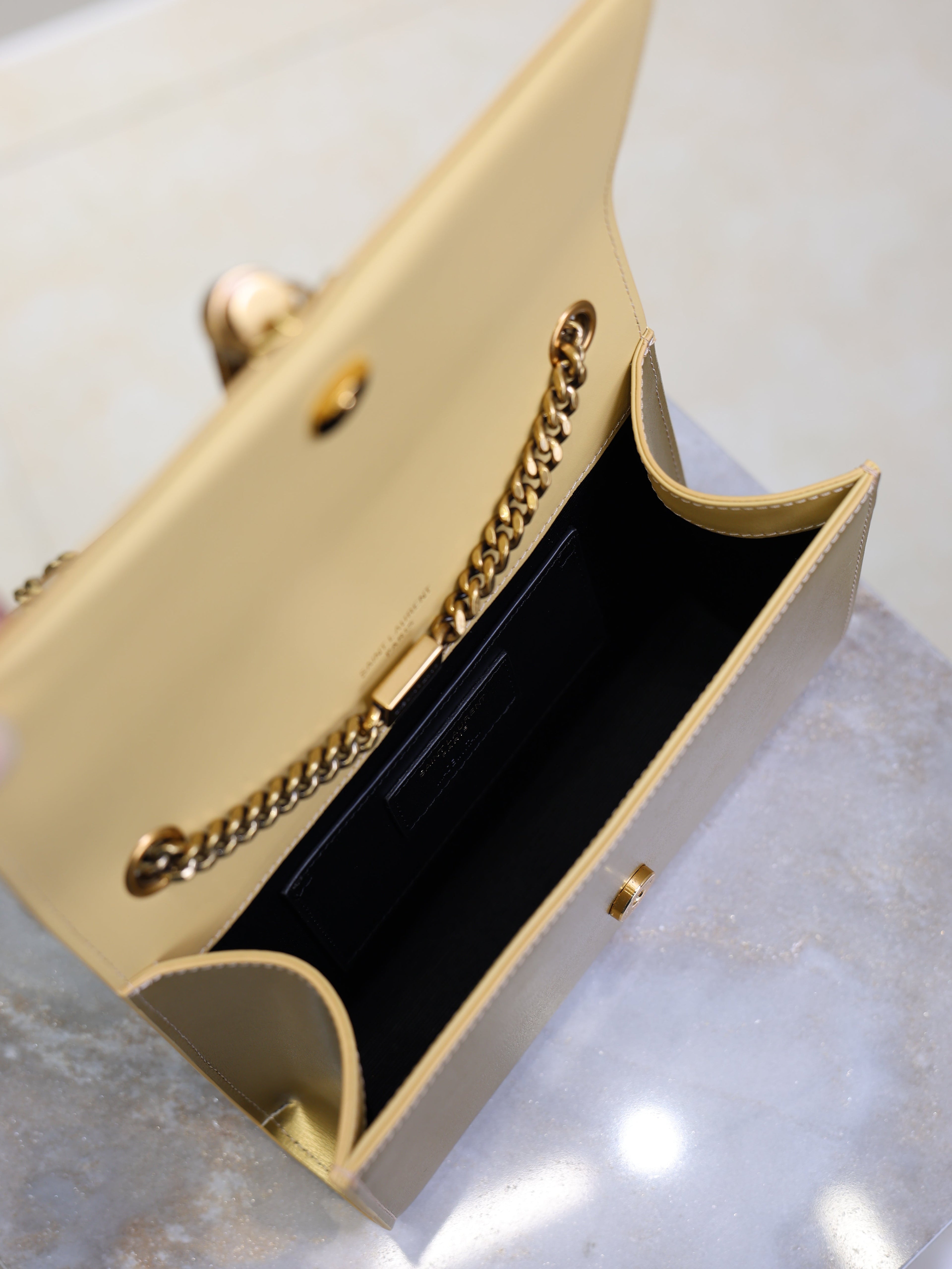 YSL 25S KATE TASSEL 20 IN GOLD METALLIC CALFSKIN GOLD HARDWRE