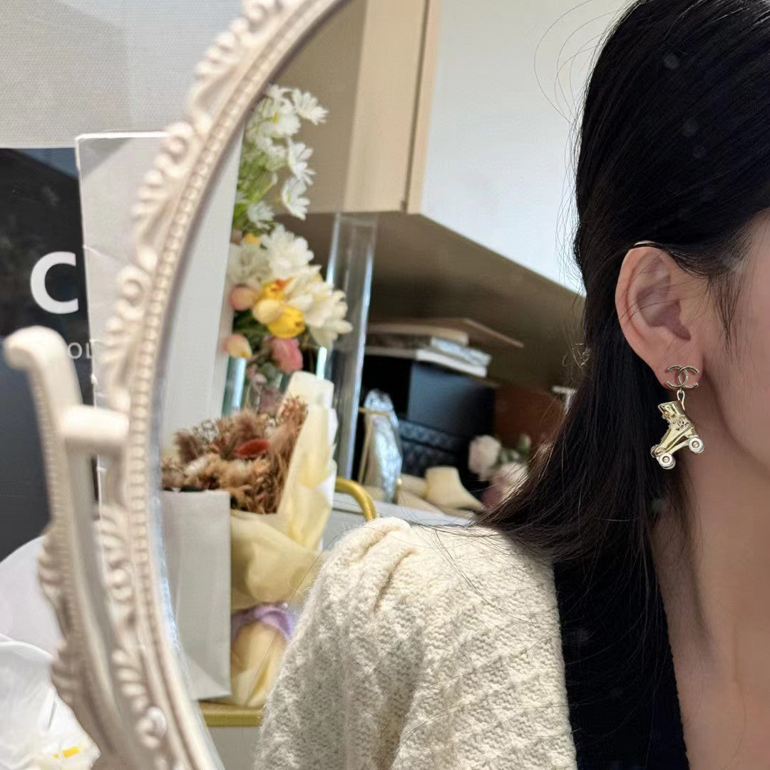 18K  Chanel Skate Shoe Pendant Earrings