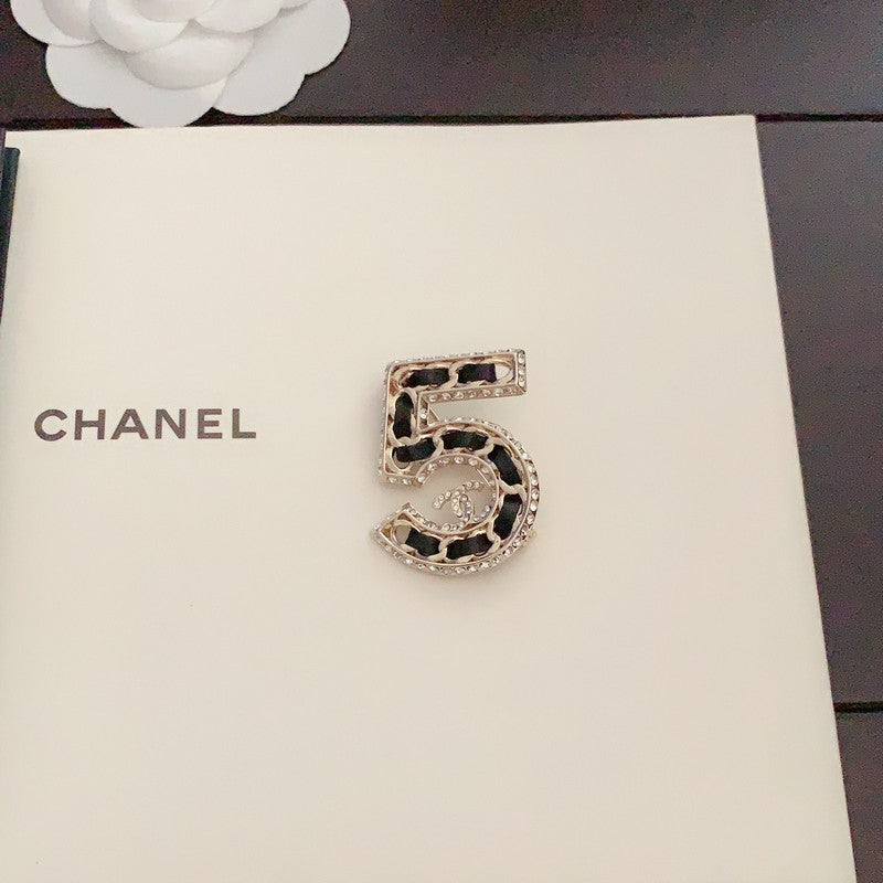 18K  Chanel No.5 Leather Diamond Brooch