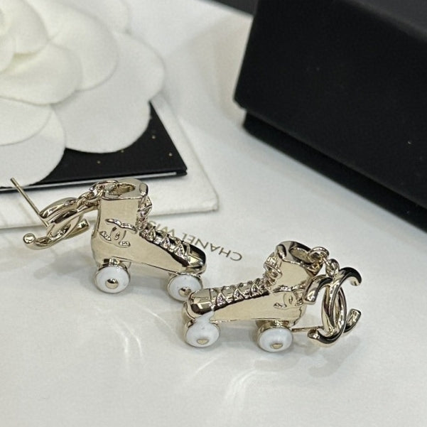 18K  Chanel Skate Shoe Pendant Earrings