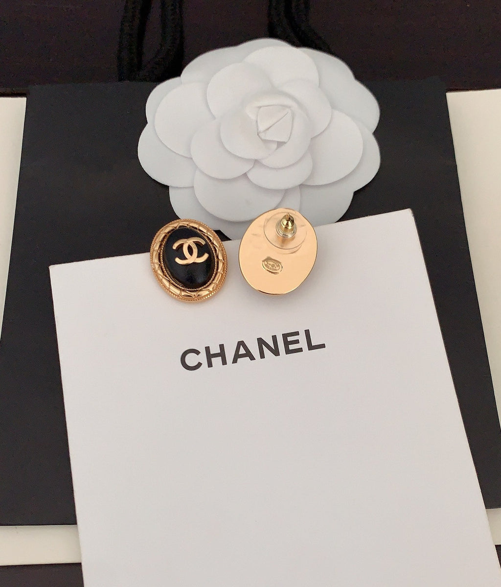 18K  Chanel Oval Leather Earrings
