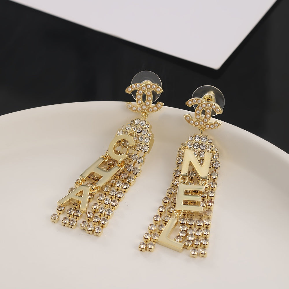 18K  Chanel Letter Earrings