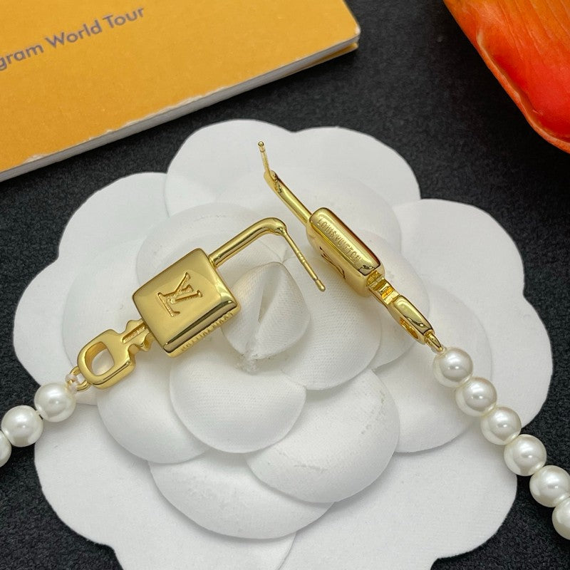 18K Louis Vuitton Pearl Lock Gold Earrings