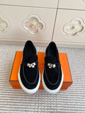 HERMES 25S SLIP-ON IN BLACK SUEDE WITH SILVER HARDWARE