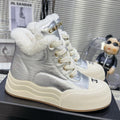 CHANEL MARTIN BOOTS IN SILVER CALFSKIN AND LAMB FUR LINING