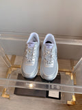 CHANEL SNEAKERS IN GLOSSY SILVER CALFSKIN AND MESH