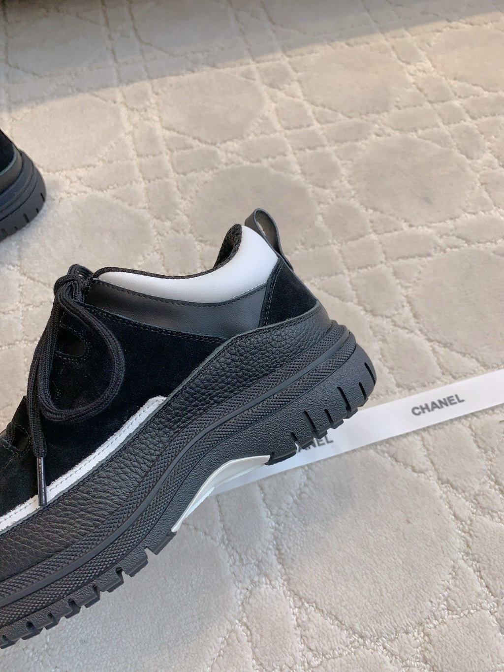 CHANEL 25S TRAINERS 40MM IN BLACK AND WHITE CALFSKIN AND SUEDE