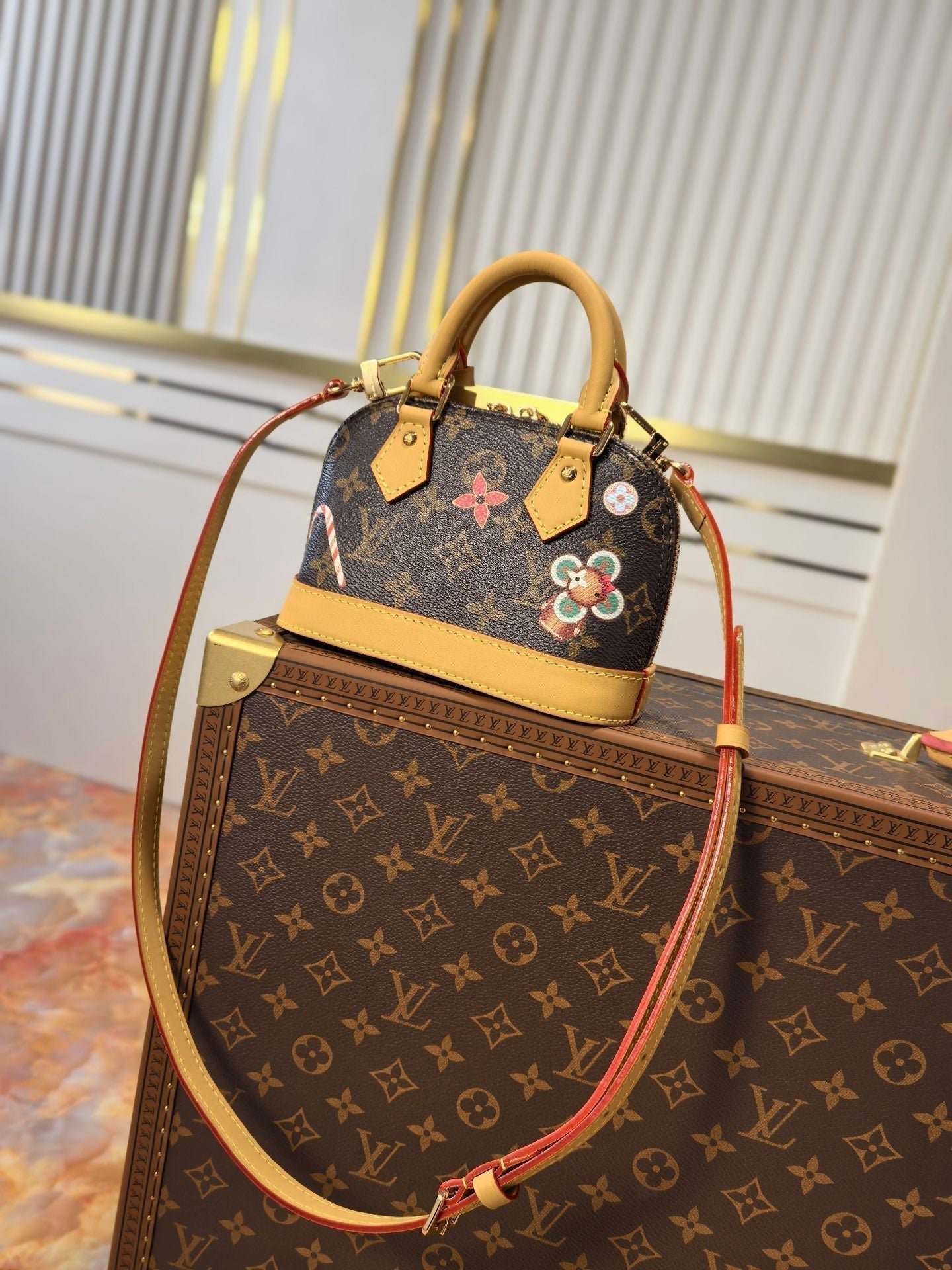 LOUIS VUITTON LV 25S NANO ALMA 18 IN BROWN MONOGRAM CANVAS PRINTED WITH THE VIVIENNE MASCOT