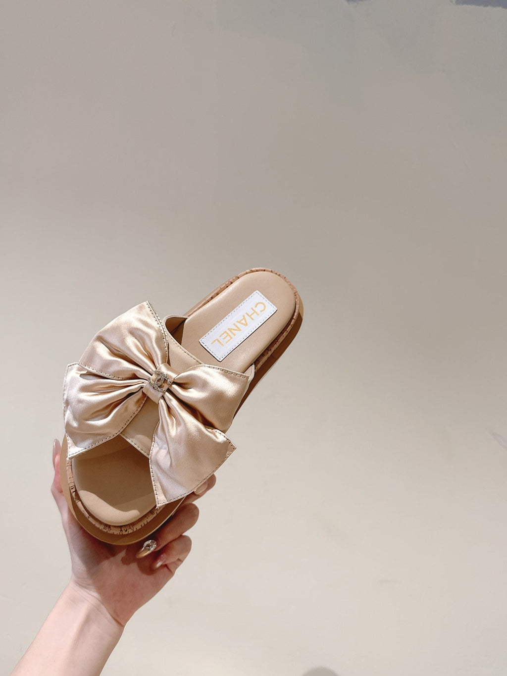 CHANEL SLIPPERS WITH SILK BOW IN BEIGE ALMOND COWHIDE