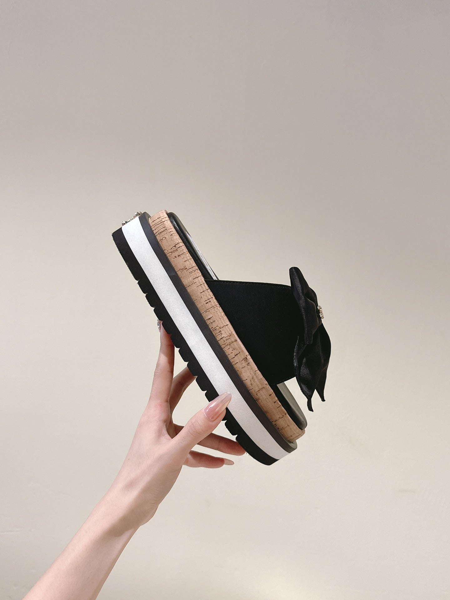 CHANEL SLIPPERS WITH SILK BOW IN BLACK COWHIDE