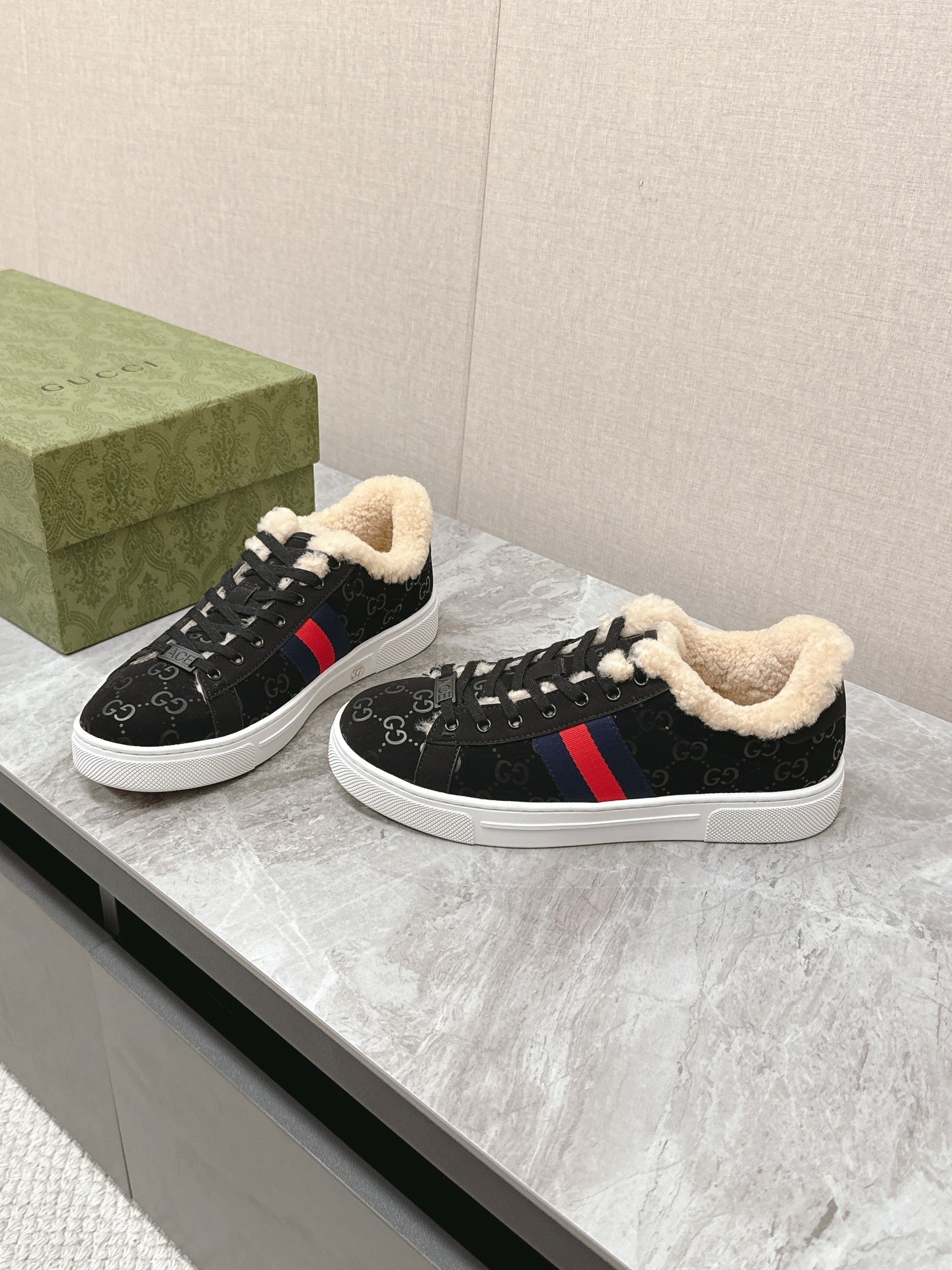 GUCCI ACE SNEAKER WITH WEB IN BLACK EMBOSSED SUEDE AND WOOL LINING