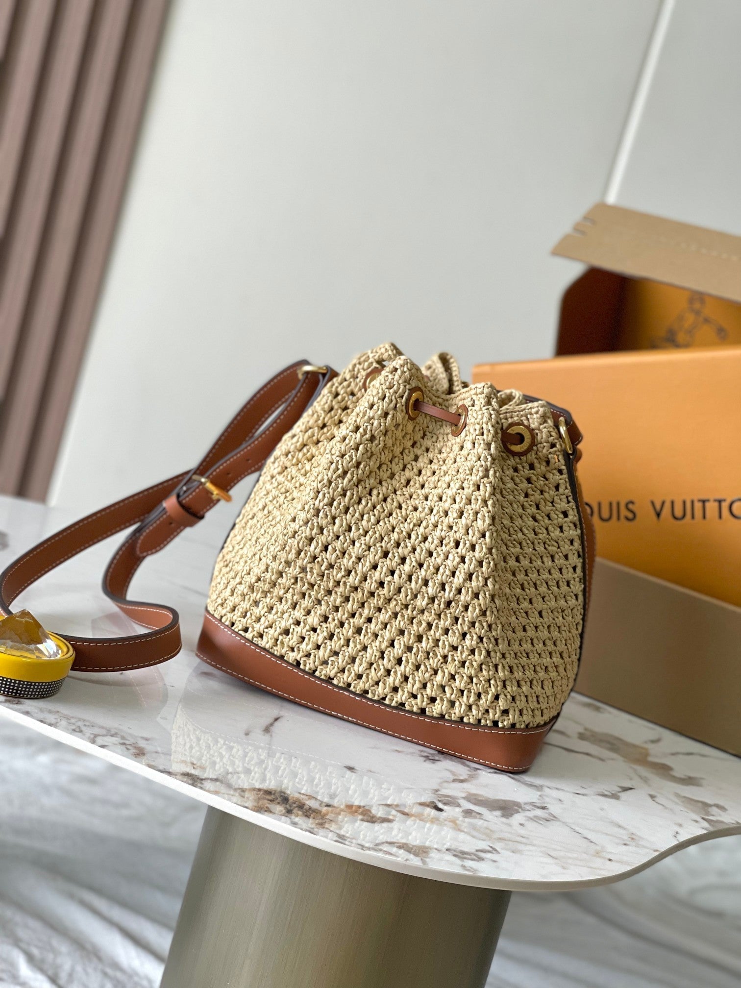 LOUIS VUITTON NOÉ PURSE 24 IN BEIGE CROCHETED RAFFIA AND BROWN CALFSKIN TRIM