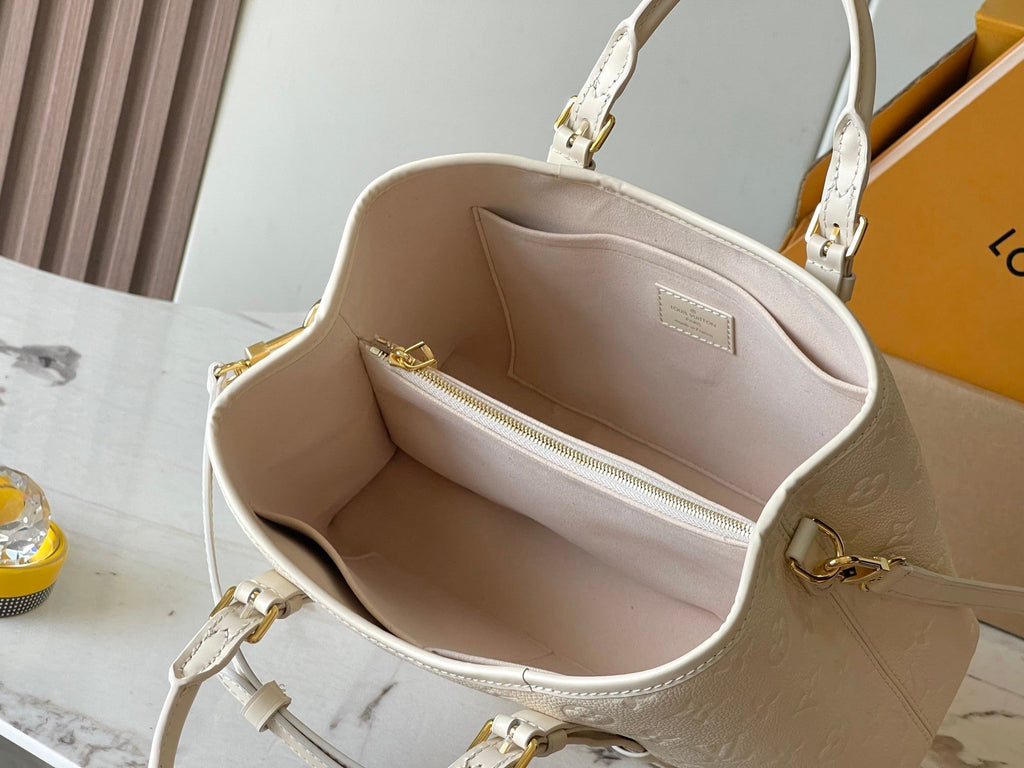 LOUIS VUITTON BABYLONE TOTE 31 IN WHITE MONOGRAM EMPREINTE LEATHER