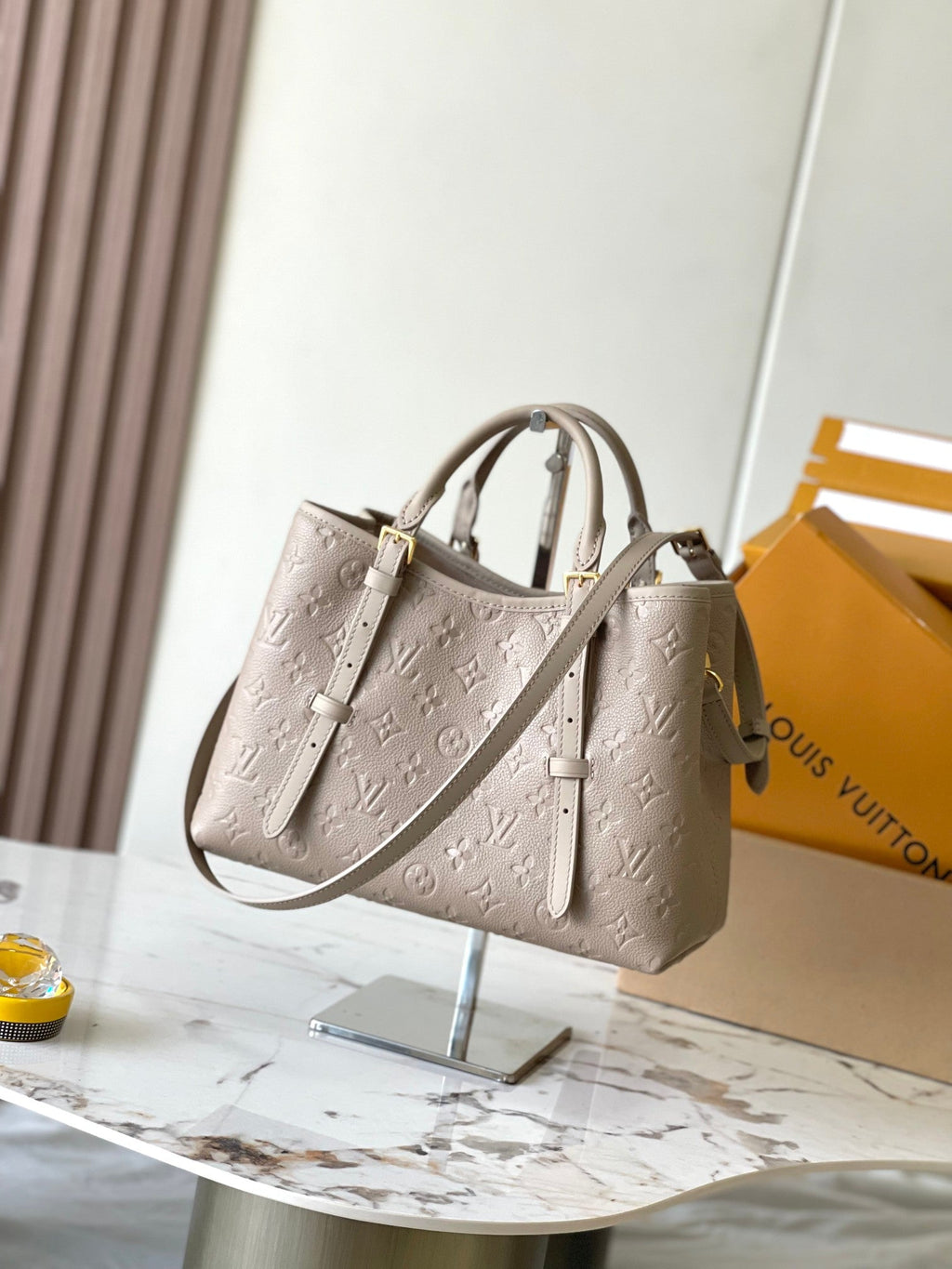 LOUIS VUITTON BABYLONE TOTE 31 IN TOURTERELLE MONOGRAM EMPREINTE LEATHER
